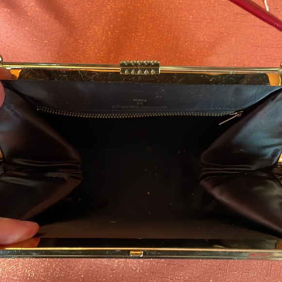 Red clutch made of genuine leather